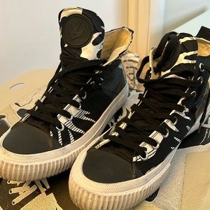 Alexander McQueen high top sneakers .. Good Condition/ lite cleaning needed.